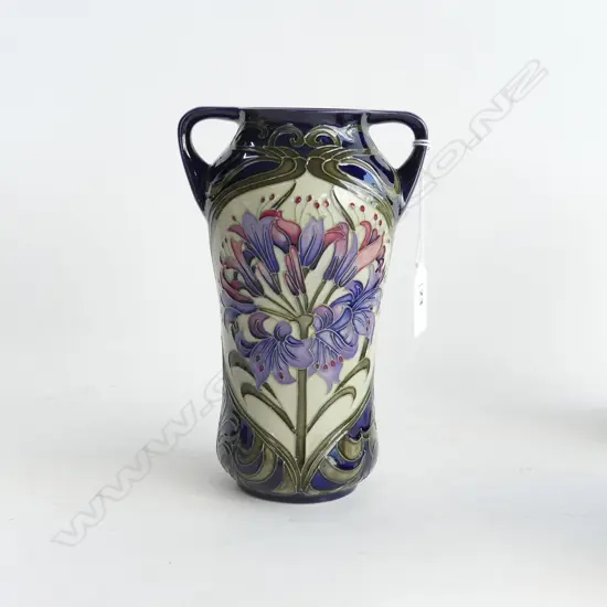 A Moorcroft two handled vase, Sweet Amaryllis pattern, designed by Kerry Goodwin, c.2010,